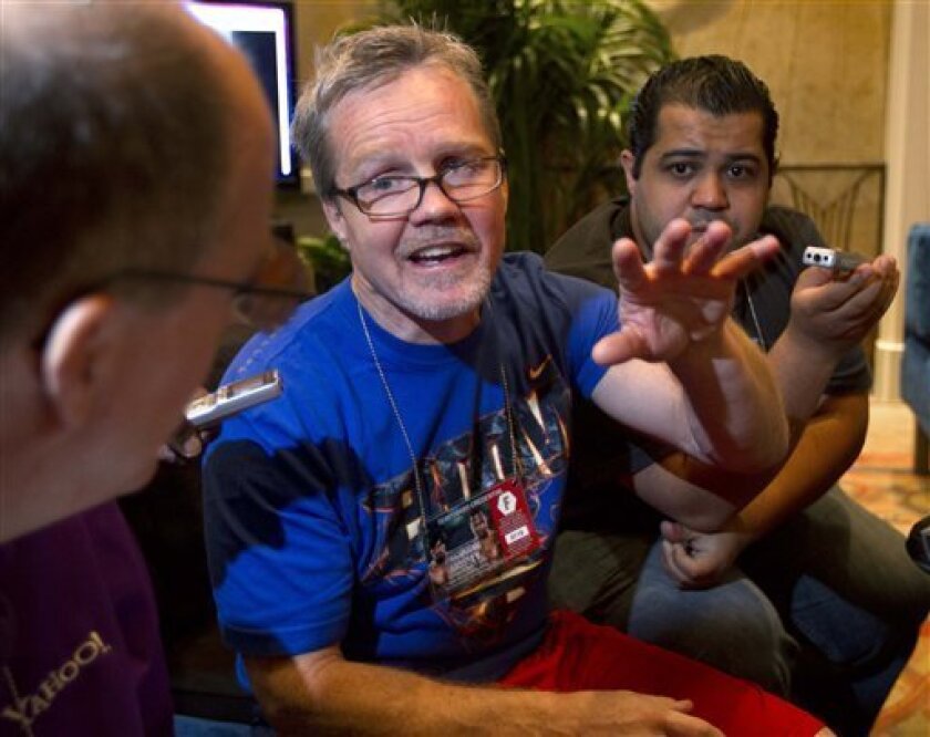 Freddie Roach, trainer for Manny Pacquiao, answers questions for reporters during a round table session with the media, Thursday, May 5, 2011, in Las Vegas. Pacquiao will defend his WBO welterweight title against Shane Mosley on Saturday. (AP Photo/Julie Jacobson)