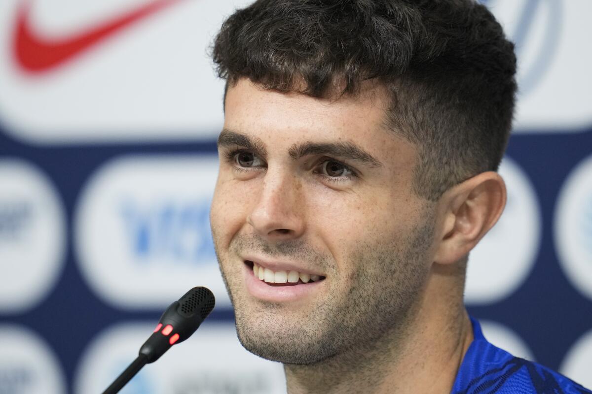 Christian Pulisic of the United States attends a press conference before a training session at Al-Gharafa SC Stadium, in Doha, Thursday, Dec. 1, 2022. (AP Photo/Ashley Landis)