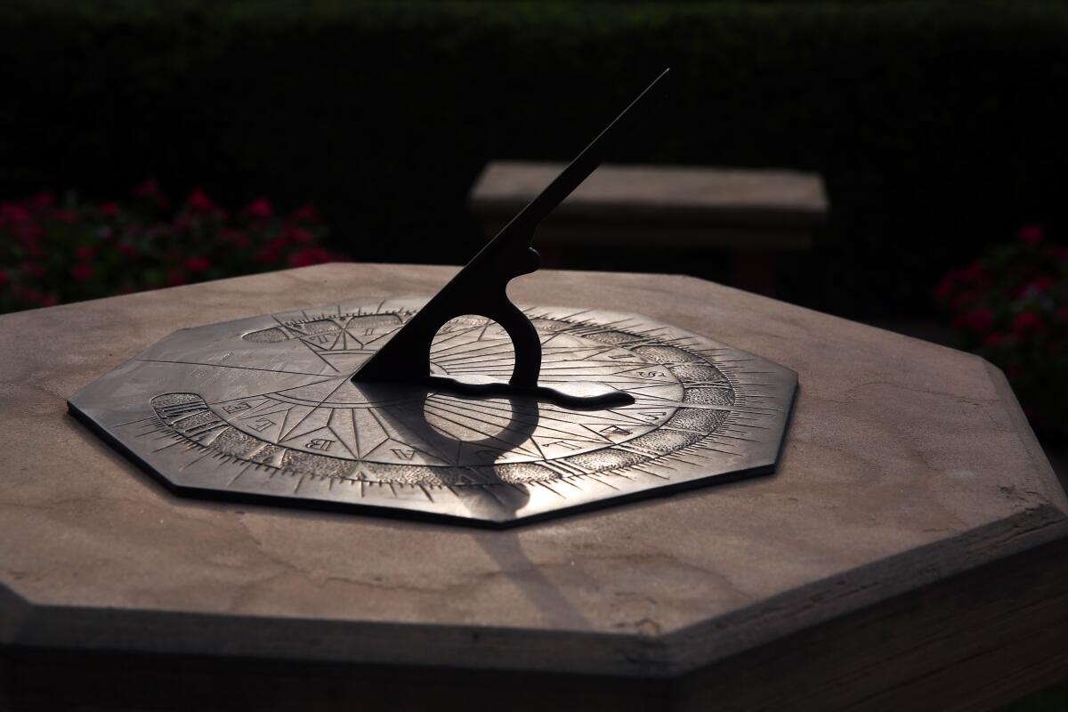 A sundial reflects sunlight.