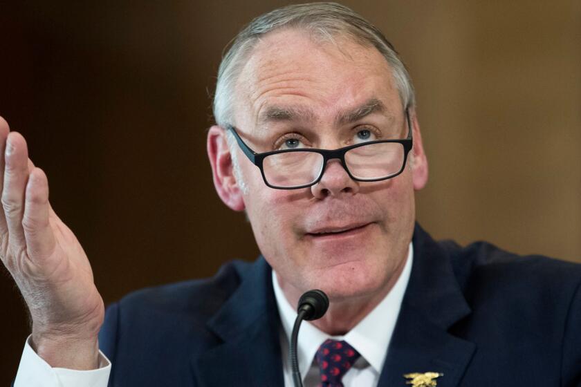 Mandatory Credit: Photo by MICHAEL REYNOLDS/EPA-EFE/REX (10034580a) (FILE) - US Interior Secretary Ryan Zinke testifies at the Senate Energy and Natural Resources Committee hearing on US President Donald J. Trump's proposed FY2019 budget for the Interior Department, on Capitol Hill in Washington, DC, USA, 13 March 2018 (reissued 15 December 2018). According to news reports, Ryan Zinke is expected to leave the Trump administration by the end of 2018. Interior Secretary Ryan Zinke leaves administration, Washington, USA - 13 Mar 2018 ** Usable by LA, CT and MoD ONLY **