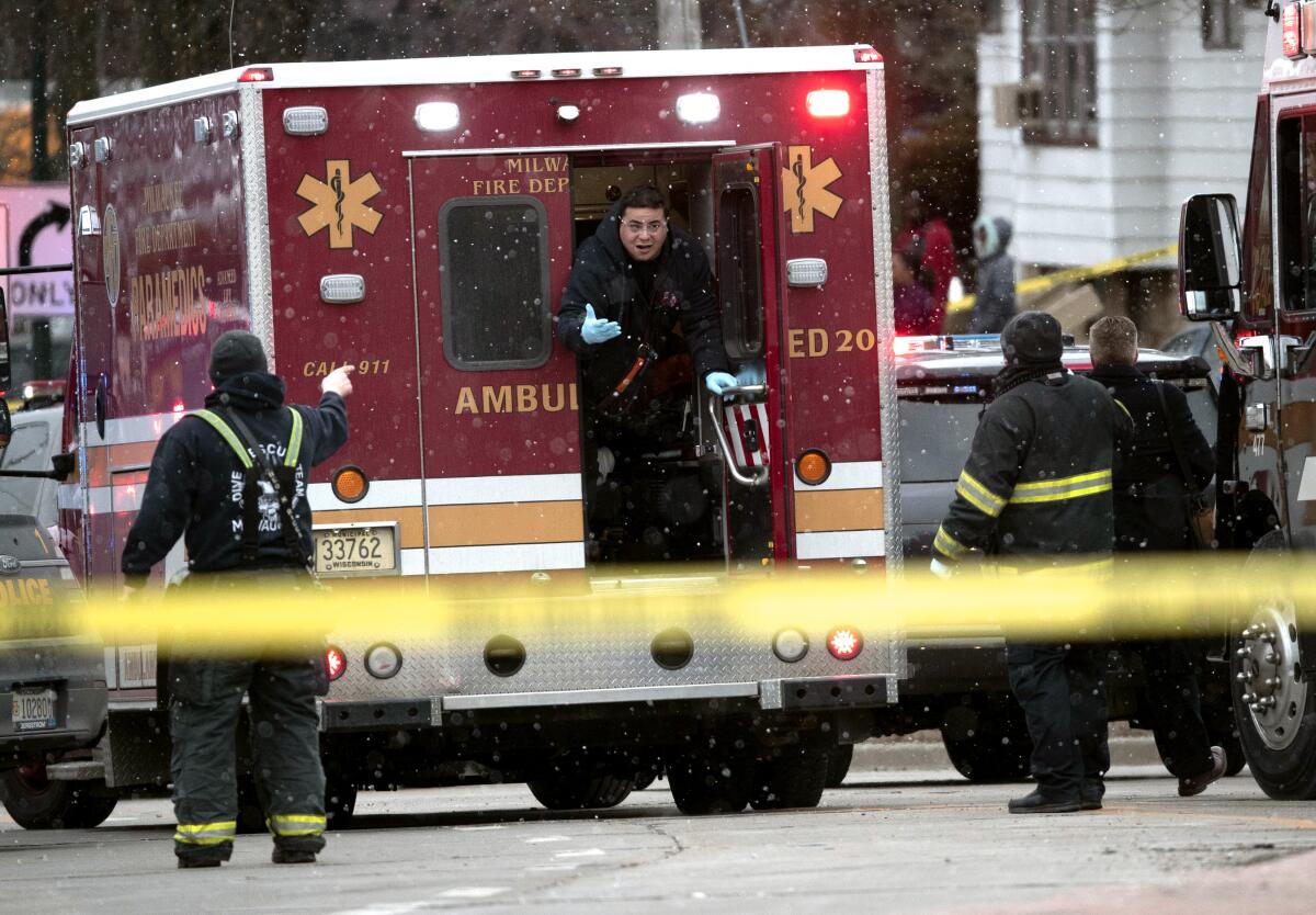 Milwaukee emergency personnel respond to a shooting at the Molson Coors Brewing Co. campus in Milwaukee on Wednesday.
