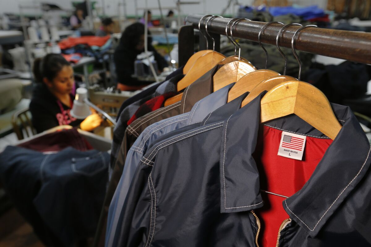 President Trump has made American manufacturing a top priority, yet many fashion brands that make goods in the U.S., such as Santa Ana surfwear company Birdwell, are cautious about getting caught up in partisan politics.