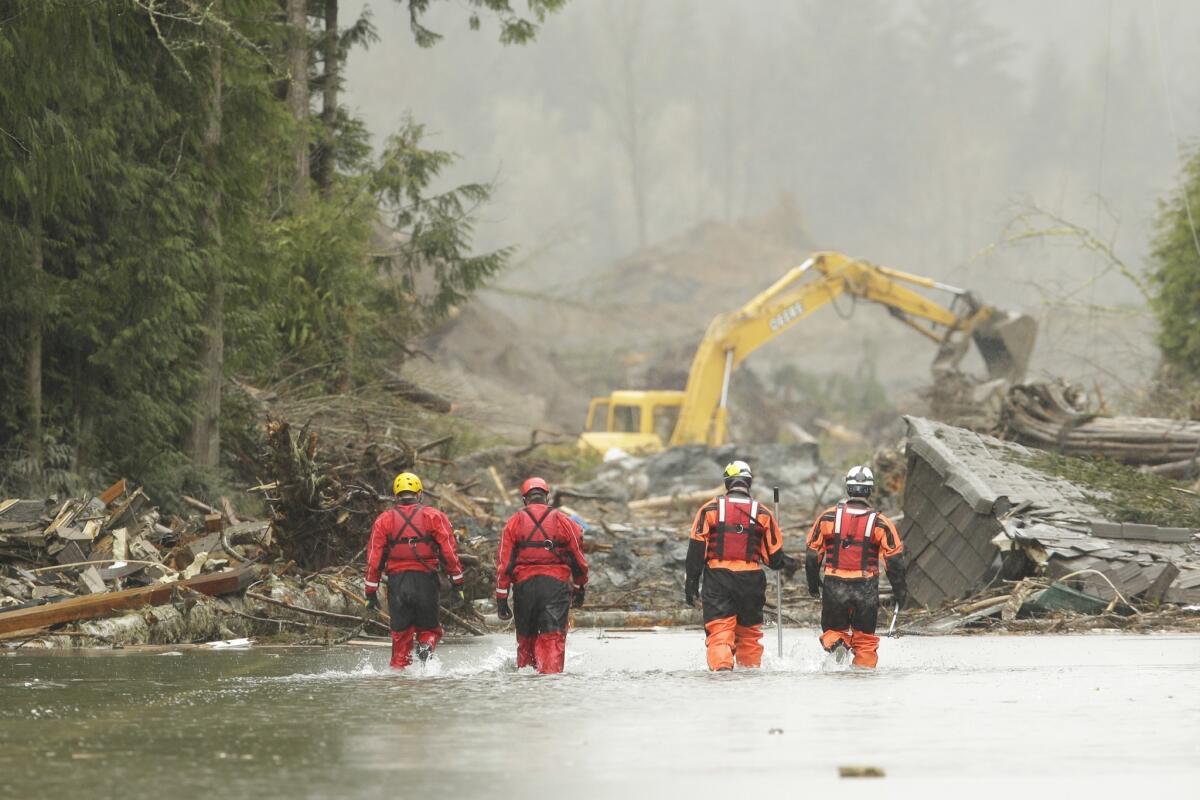 Mudslide search and rescue teams continue to work in Oso, Washington.