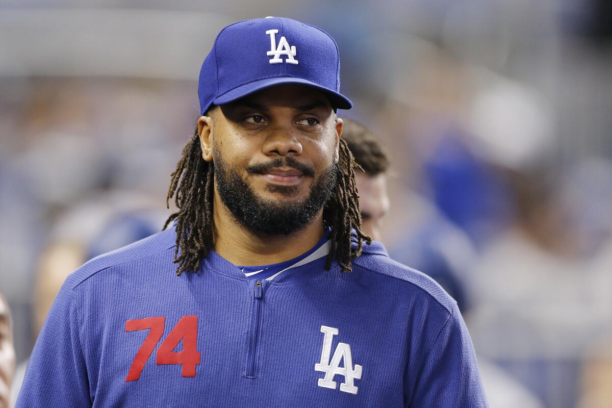 Dodgers closer Kenley Jansen walks on the field before a game against the Miami Marlins on August 15.
