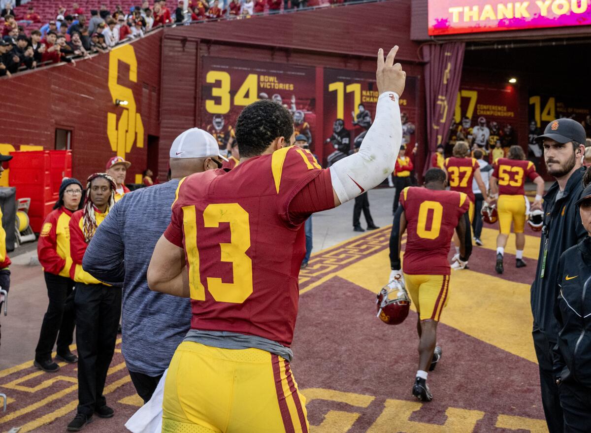 USC quarterback Caleb Williams jogs off the field following a 38-20 loss to UCLA at the Coliseum on Saturday.