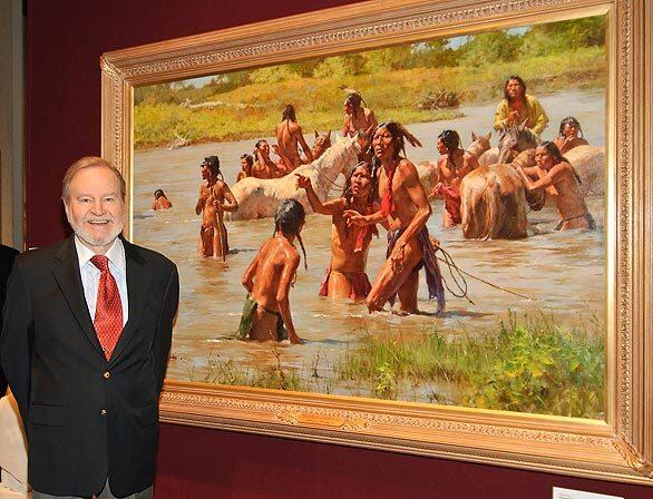 Artist Howard Terpning stands before his work "The Sound of a Distant Bugle" at the "Masters of the American West" cocktail reception and benefit sale at the Autry Museum in Los Angeles on Feb. 6, 2010.