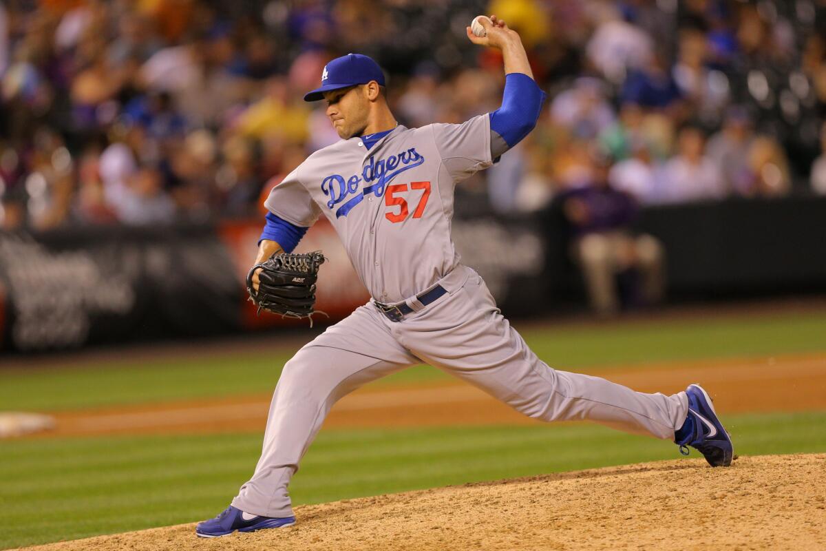 Scott Elbert is a surprise addition to the Dodgers' postseason roster.
