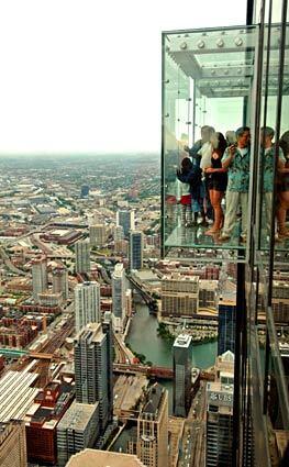The glass boxes known as the Ledge in Chicago's former Sears Tower (now known as Willis Tower) jut out from the 103rd floor for an exhilarating view.