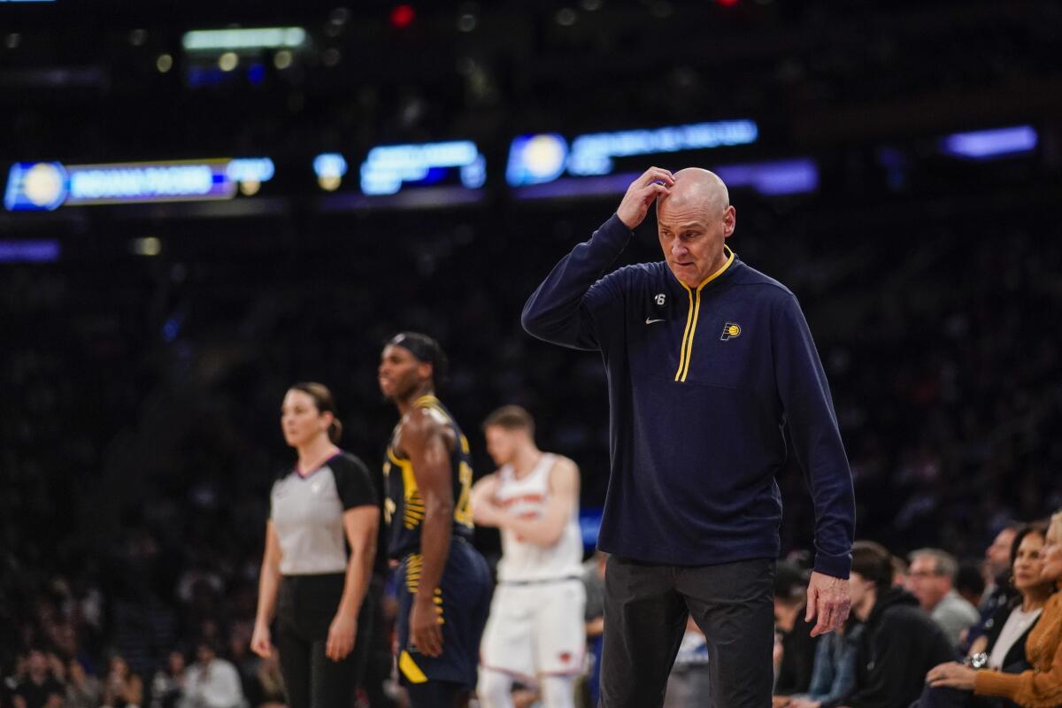 Indiana Pacers head coach Rick Carlisle, front right, reacts during the second half of a preseason NBA basketball game against the New York Knicks, Friday, Oct. 7, 2022, in New York. (AP Photo/Eduardo Munoz Alvarez)