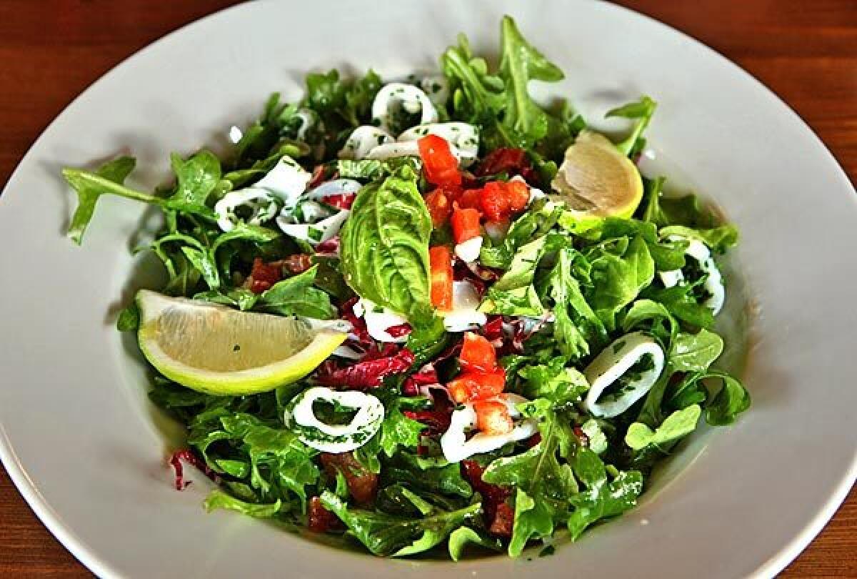 The Amalfi salad is made with calamari, arugula, radicchio, basil, tomato and lemon citrus vinaigrette.