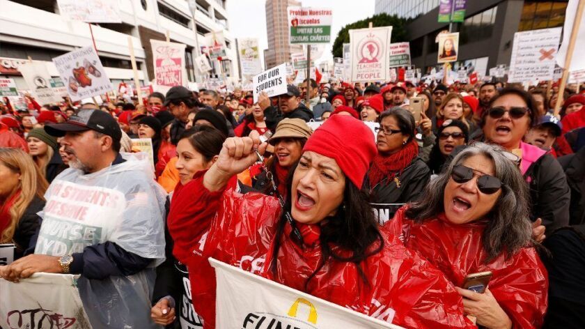 Members and supporters of United Teachers Los Angeles rally outside the California Charter Schools Assn. office in downtown Los Angeles during the L.A. Unified School District teachers' strike on Jan. 15, 2019.