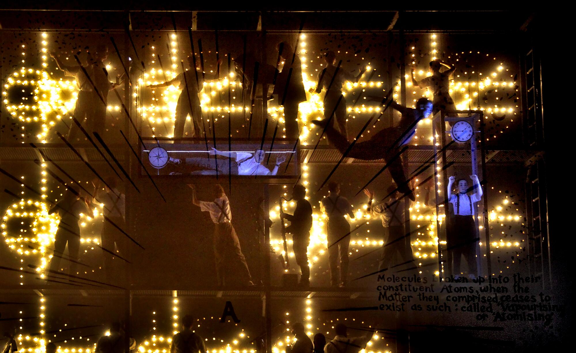 Performers stand on a backlit series of platforms on a stage.