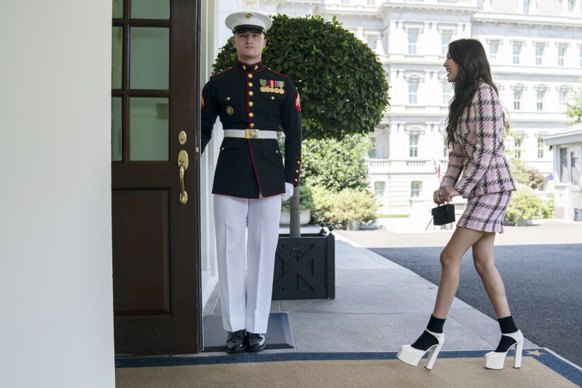 Singer Olivia Rodrigo arrives at the White House to promote the COVID-19 vaccine, Wednesday, July 14, 2021, in Washington. (AP Photo/Evan Vucci)