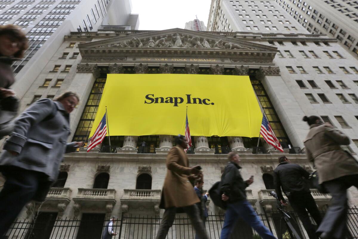 A Snap Inc. banner hangs at the New York Stock Exchange in March 2017. 