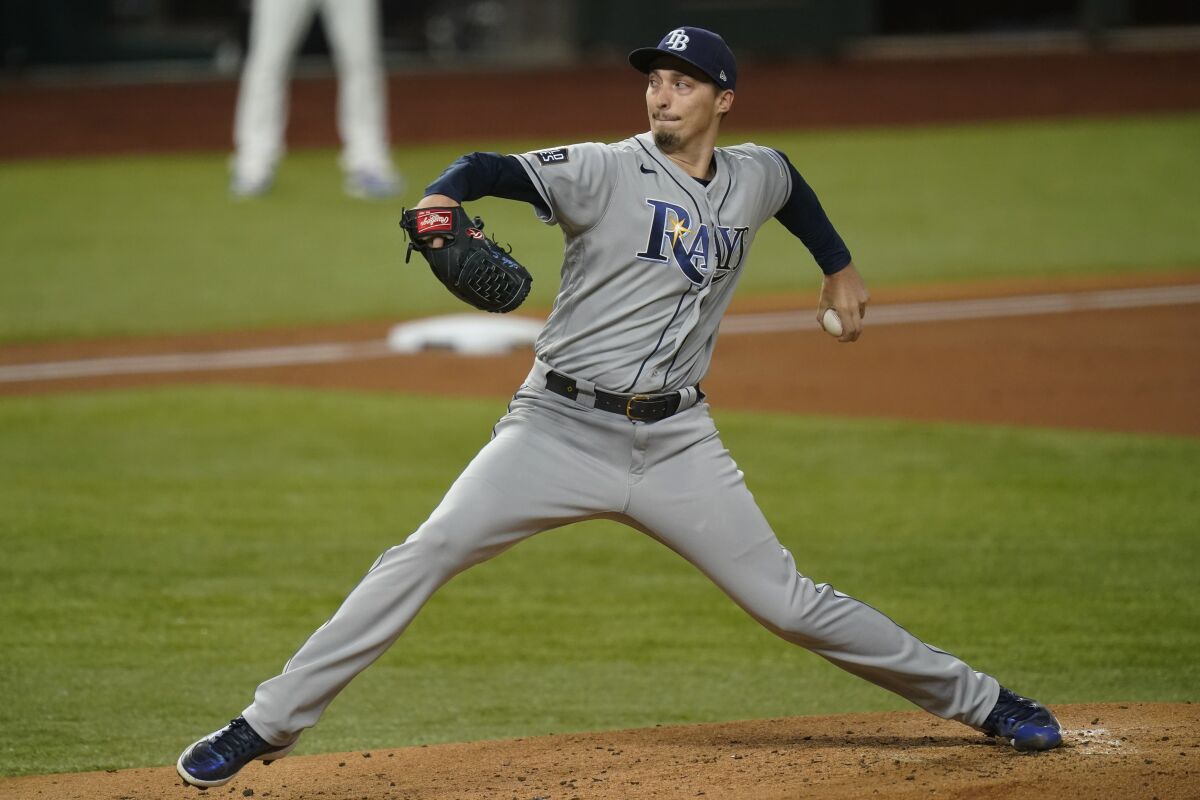 Tampa Bay Rays starting pitcher Blake Snell throws against the Dodgers.