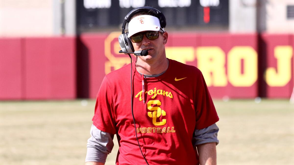 Former USC defensive coordinator Justin Wilcox calls a play during a fall scrimmage at Howard Jones Field in August 2015.