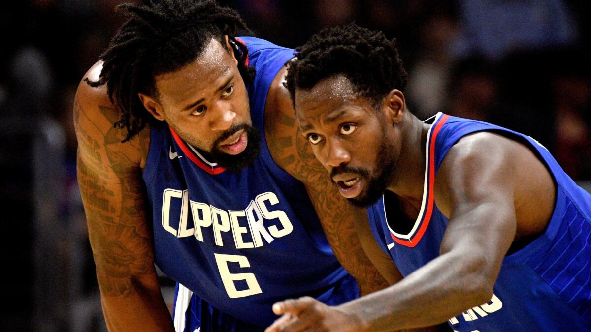 Clippers center DeAndre Jordan (6) will not have guard Patrick Beverley to help lead the defense during the rest of the team's trip.