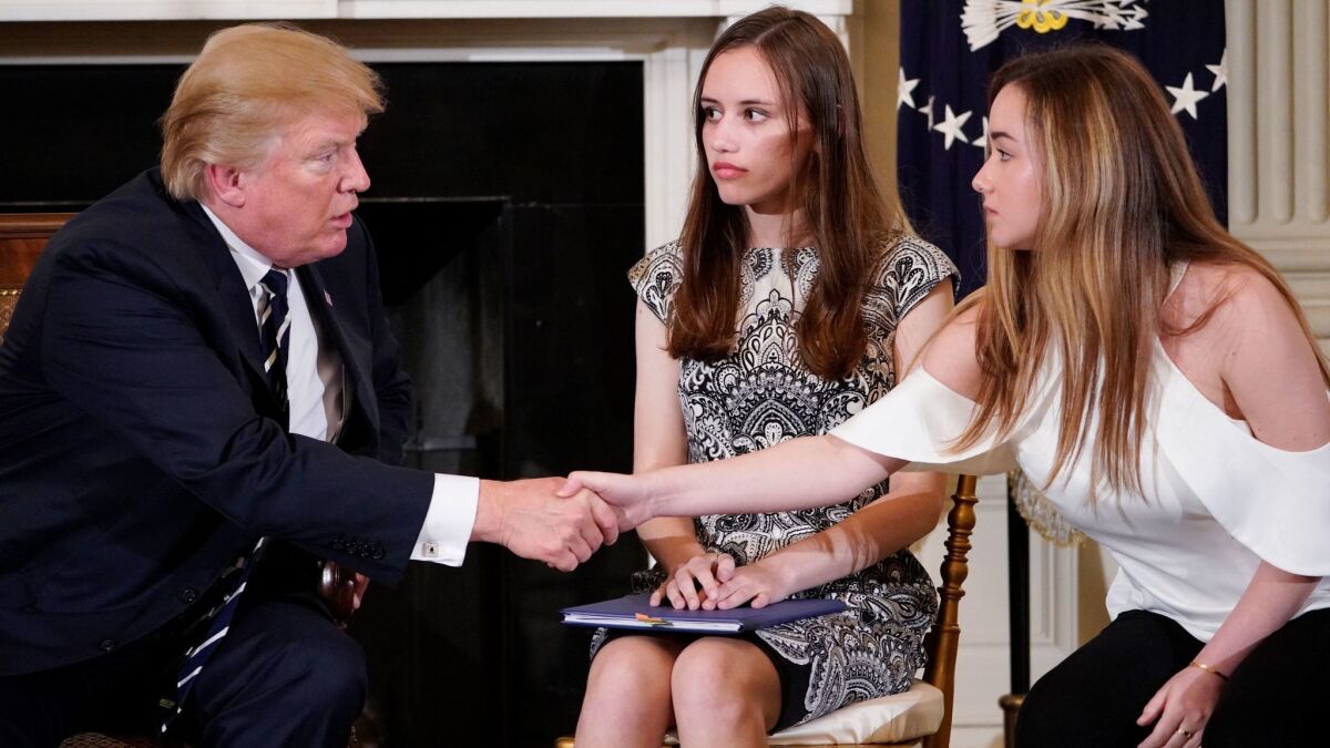 Ariana Klein meets Trump at the White House. In the middle is shooting survivor Carson Abt.