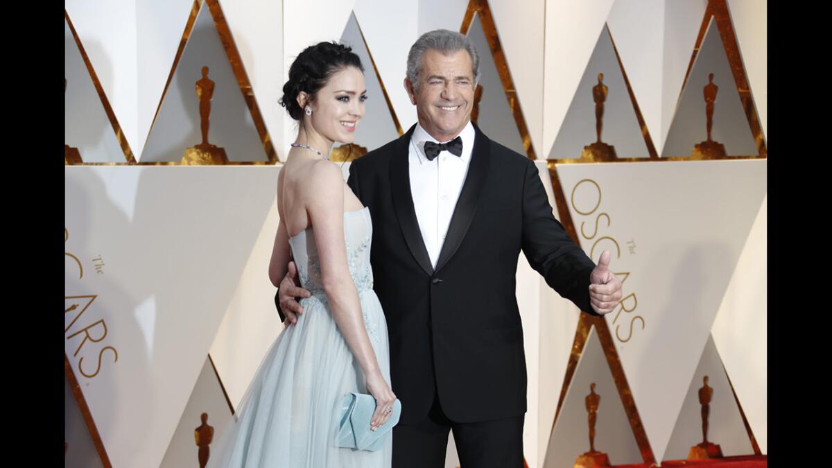 Mel Gibson and Rosalind Ross on the red carpet.