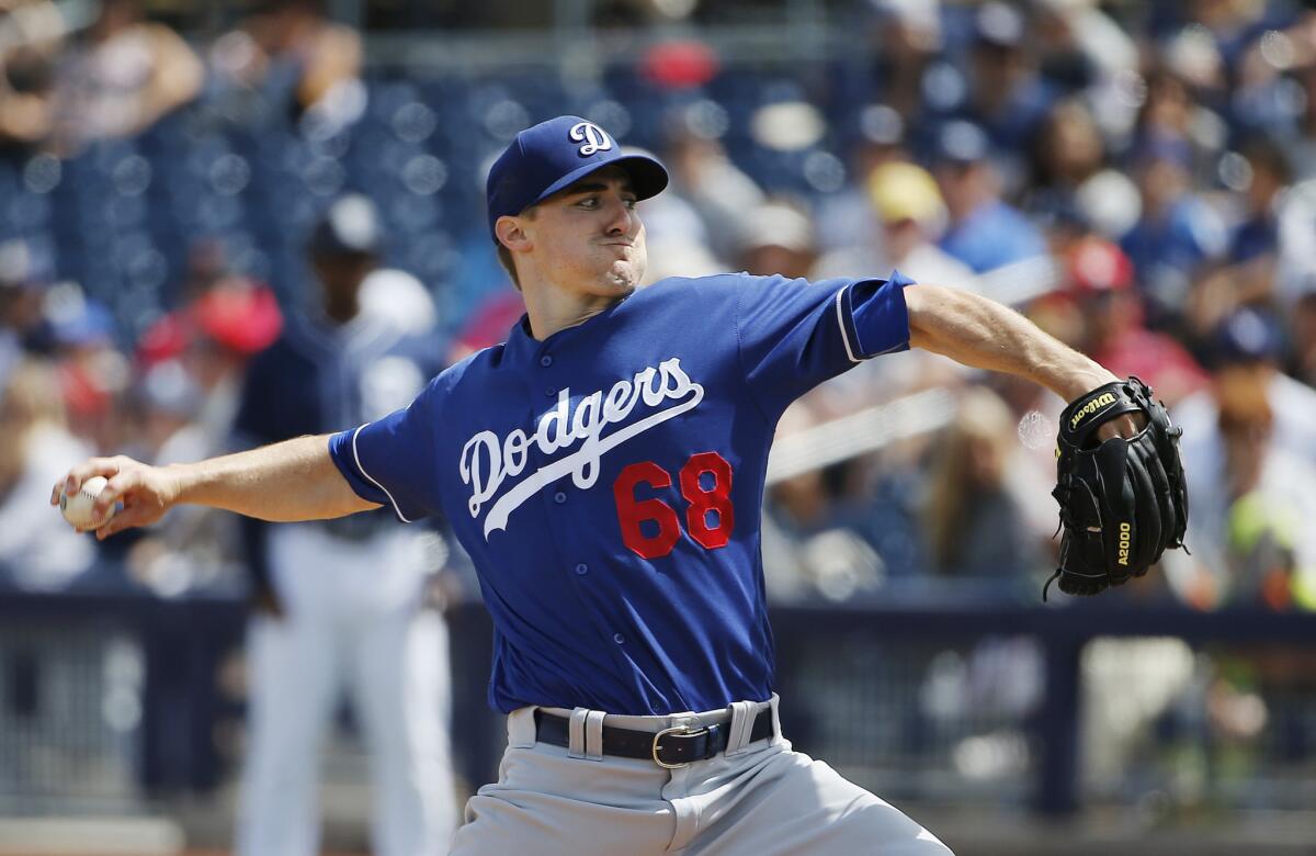 Dodgers right-hander Ross Stripling throws a pitches against the Padres during the first inning of a spring training game on March 29.