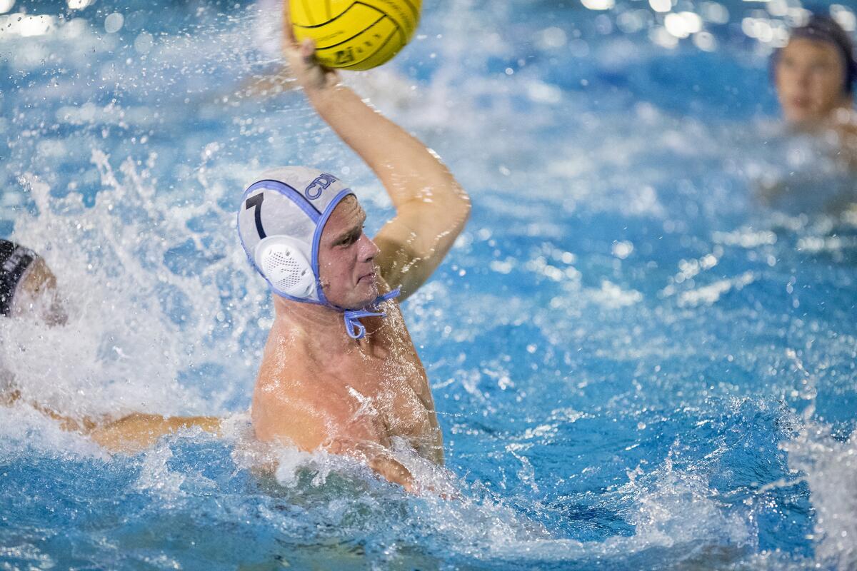 Corona del Mar's Luke Zimmerman takes a shot during the Battle of the Bay rivalry match on Wednesday.