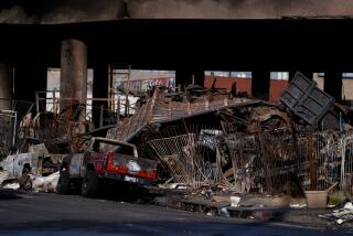 LOS ANGELES CA NOVEMBER 13, 2023 - The site of a fire under Interstate 10 in Los Angeles, California. (Eric Thayer / For The Times)