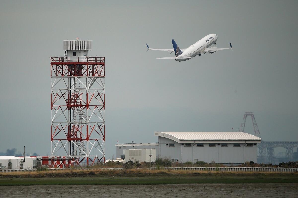 A United Airlines plane takes off from San Francisco International Airport. The carrier promises to beat its competitors in reliability.