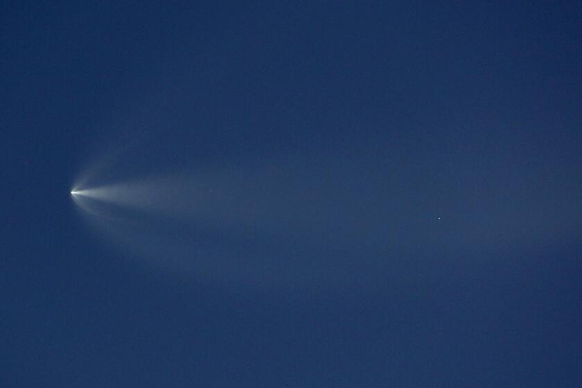 A Falcon 9 rocket launched from Vandenberg Space Force Base at dusk carried 22 Starlink internet satellites into low-Earth orbit as seen from Whittier, California on April 1, 2024.