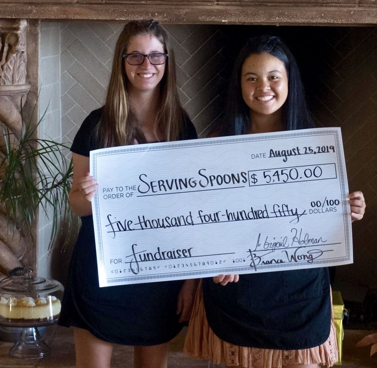 Serving Spoons President Abigail Holman and Vice President Bianca Wong are students at La Jolla Country Day School.