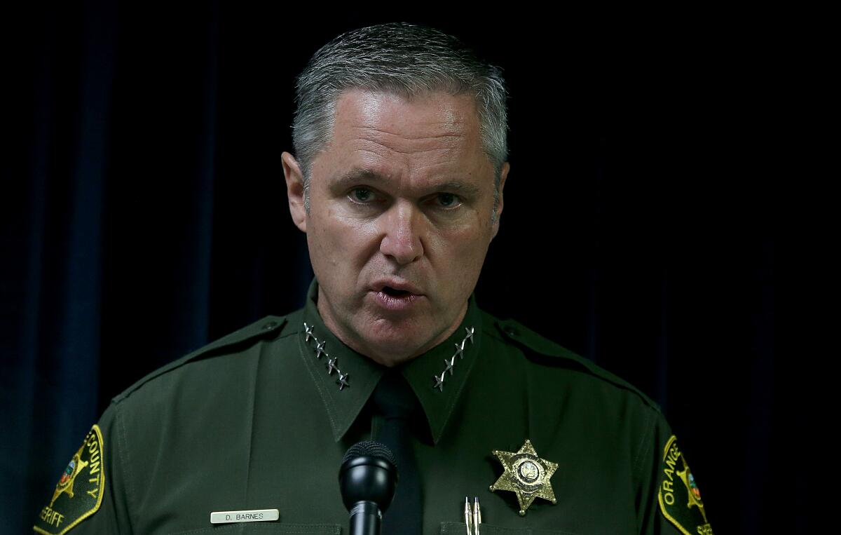Orange County Sheriff Don Barnes speaks during a monthly media briefing in Santa Ana.