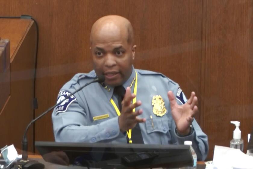 In this image from video, witness Minneapolis Police Chief Medaria Arradondo testifies as Hennepin County Judge Peter Cahill presides Monday, April 5, 2021, in the trial of former Minneapolis police Officer Derek Chauvin at the Hennepin County Courthouse in Minneapolis. Chauvin is charged in the May 25, 2020 death of George Floyd. (Court TV via AP, Pool)