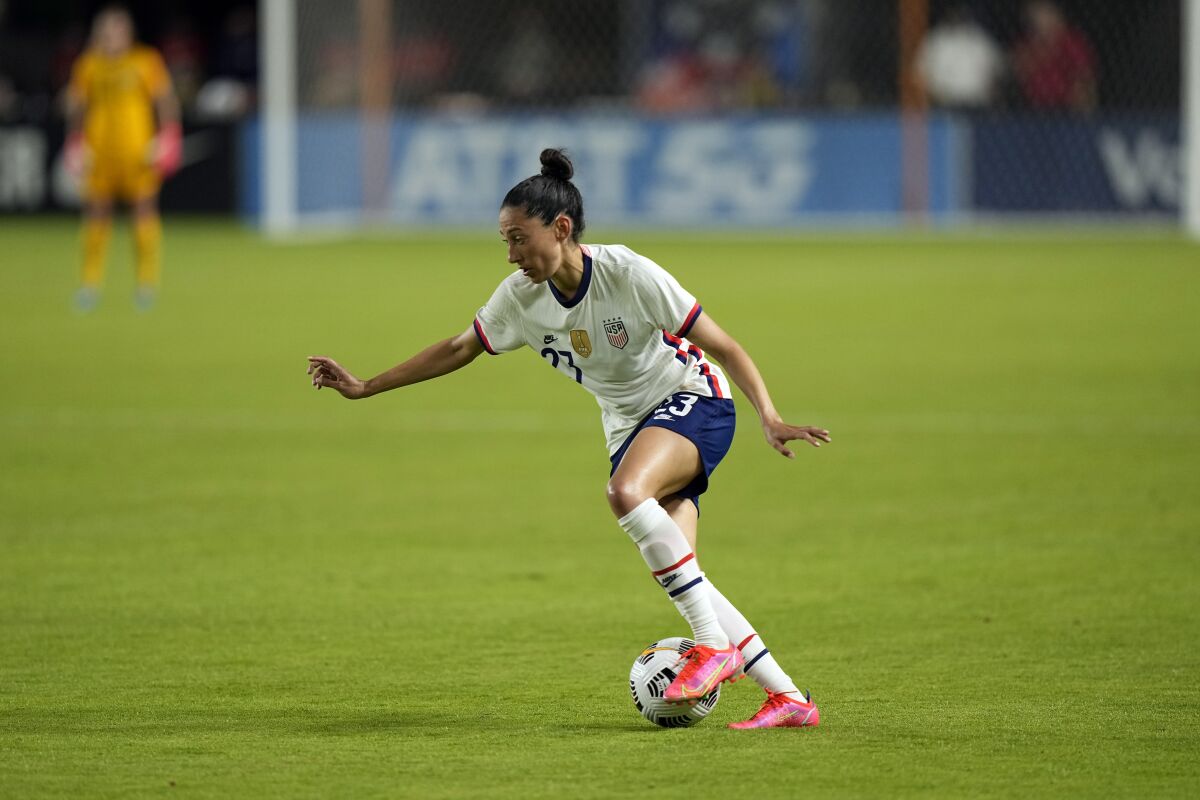 Christen Press controls the ball during a match against Portugal in June  2021.