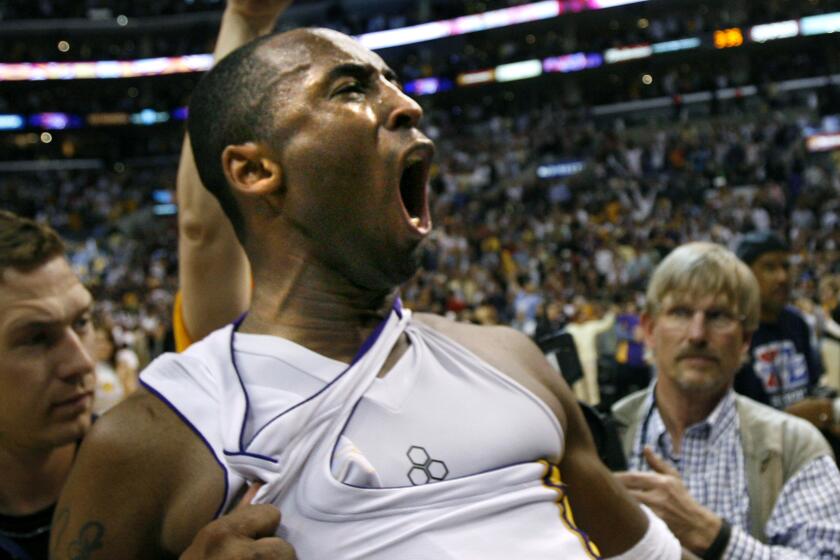 Skalij, Wally –– – Lakers Kobe Bryant celebrates his game–winning shot in overtime against the Phoenix Suns in Game 4 of the NBA Western Conference first round playoffs at Staples Center Sunday, April 30, 2006.