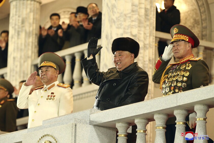 FILE - In this photo provided by the North Korean government, North Korean leader Kim Jong Un waves as Kim attended a military parade, marking the ruling party congress, at Kim Il Sung Square in Pyongyang, North Korea on Jan. 14, 2021. Since taking over supreme leadership a decade ago, Kim has presented many faces to an insatiably curious world, but while the image shifts perhaps the most telling way to consider Kim is through his persistent pursuit of a nuclear weapons program meant to target America and its allies. The content of this image is as provided and cannot be independently verified. Korean language watermark on image as provided by source reads: "KCNA" which is the abbreviation for Korean Central News Agency. (Korean Central News Agency/Korea News Service via AP, File)