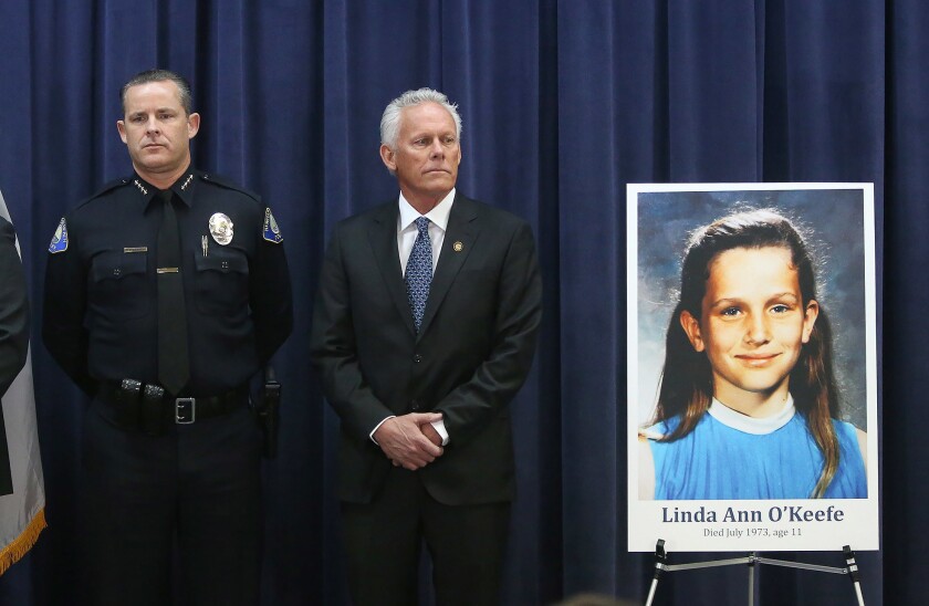 Newport Beach Police Chief Jon Lewis, left, and Councilman Brad Avery attend a news conference announcing the arrest of a man in the 1973 killing of Linda Ann O'Keefe.