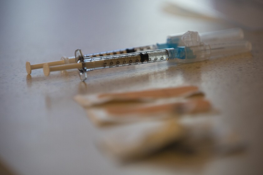 SARS-CoV-2 Pfizer vaccine in syringes.