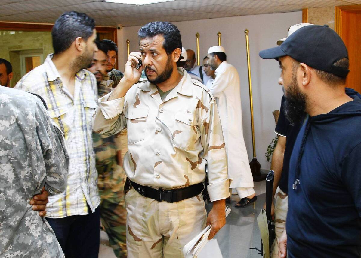Abdel Hakim Belhaj, center, a rebel military commander during the Libyan uprising last year, is reported to be one of the detainees who was subjected to harsh interrogation while in CIA custody.