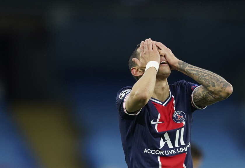 PSG's Angel Di Maria gesture after missing a chance during the Champions League semifinal second leg soccer match between Manchester City and Paris Saint Germain at the Etihad stadium, in Manchester, Tuesday, May 4, 2021. (AP Photo/Dave Thompson)