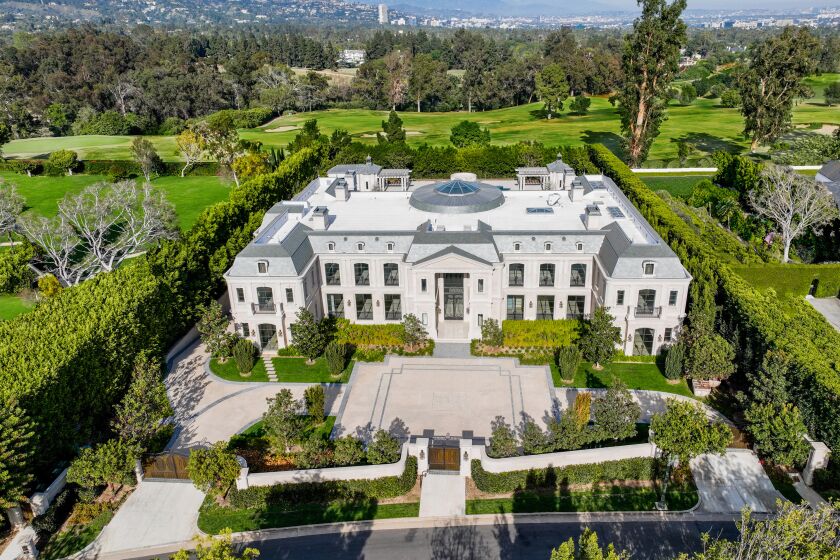 For sale: a French chateau-style mansion in one of Los Angeles' most exclusive neighborhoods, Holmby Hills, complete with 11 bedrooms, 27 bathrooms, and an asking price of $63.5 million.