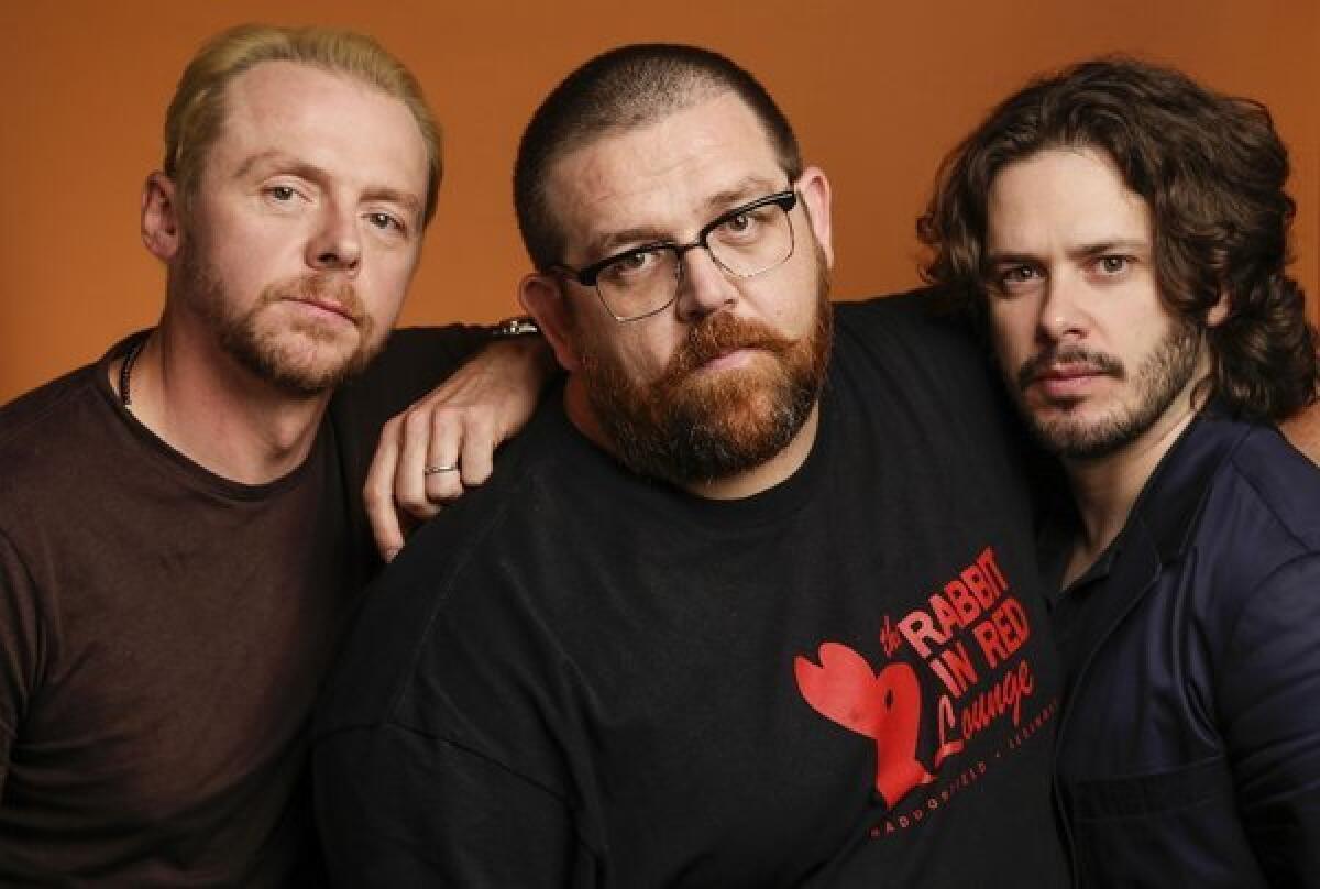 Simon Pegg, left, Nick Frost and director Edgar Wright have reunited for the film comedy, "The World's End," which has been winning strong early reviews.