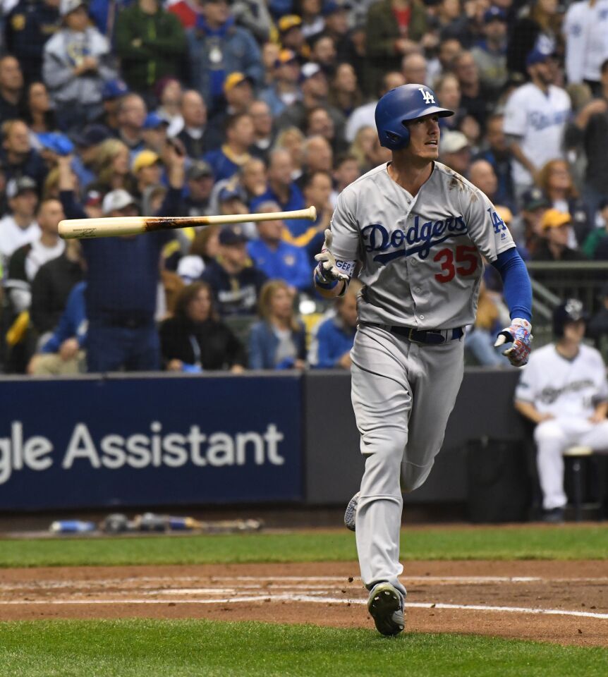 Dodgers Cody Bellinger tosses the bat after hitting a two run home run in the second inning.
