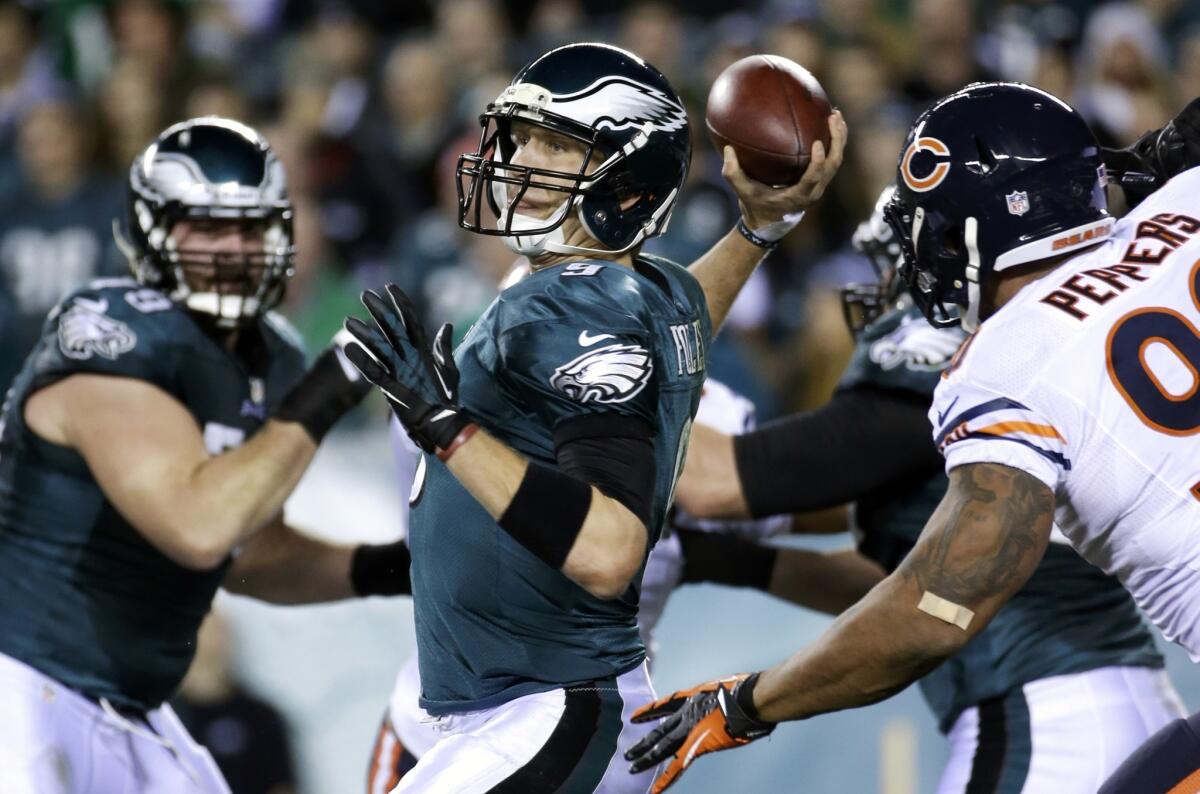 Philadelphia quarterback Nick Foles passes during the first half of the Eagles' 54-11 victory over the Chicago Bears on Sunday night.