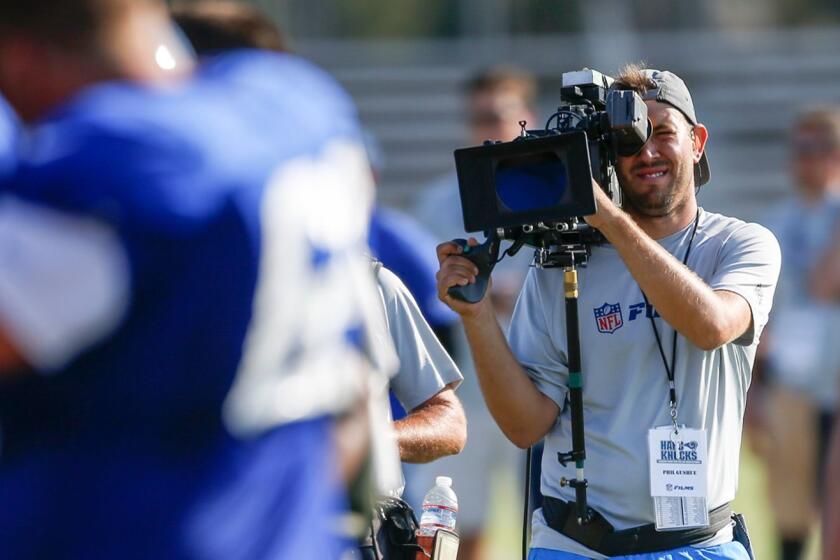 IRVINE, CA., AUGUST 1, 2016: Hard Knocks camera crews document every move at the LA Rams training camp at UC Irvine from the field to the locker room with an all-access approach to document what it takes to make it in the NFL August 1, 2016 (Mark Boster/ Los Angeles Times).