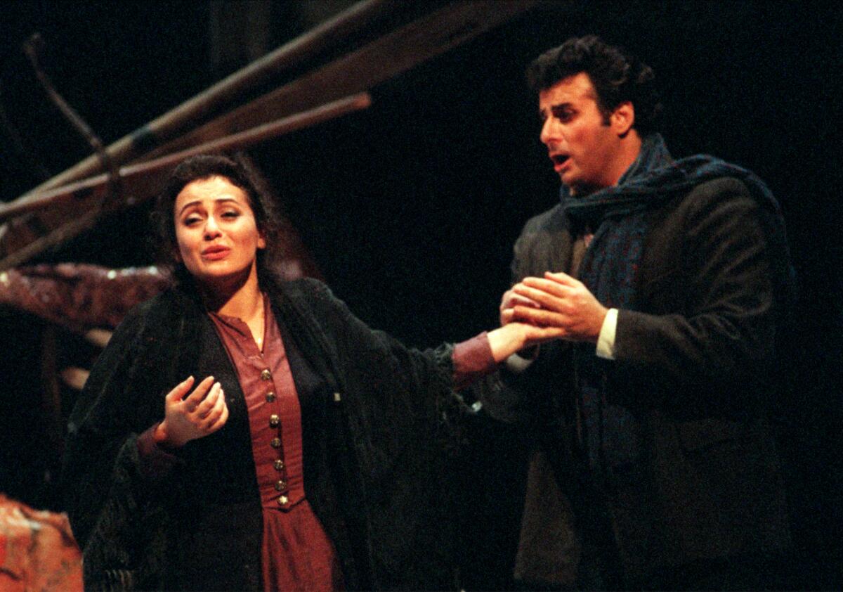 Leontina Vaduva and Marcello Giordani in Opera Pacific's production of "La Boheme" at the Orange County Performing Arts Center in Costa Mesa in 1998.
