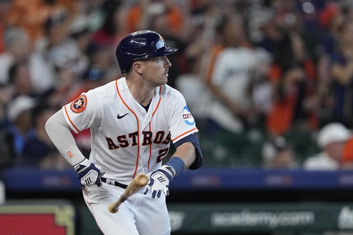 The Astros' Alex Bregman watches his fourth-inning grand slam against the Angels on June 3, 2023.