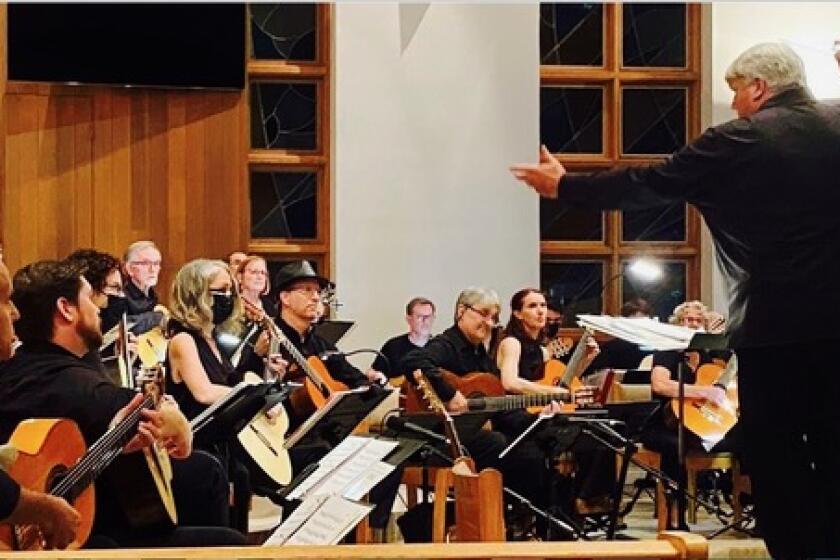 Music director Peter Pupping and The Encinitas Guitar Orchestra