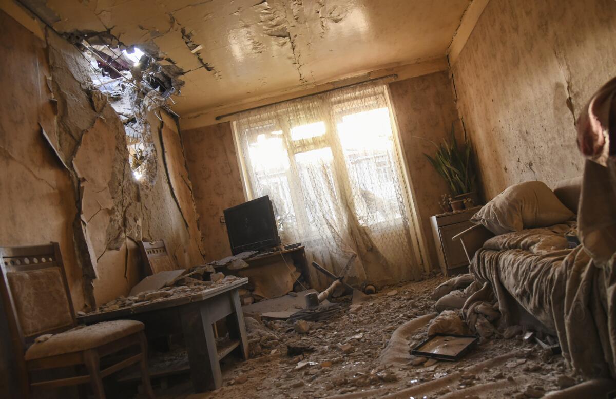Damage inside an apartment after shelling in the separatist region of Nagorno-Karabakh on Saturday.