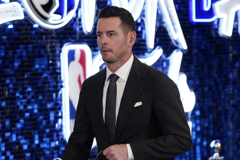 ESPN analyst JJ Redick arrives for Game 4 of the NBA Finals on Friday in Dallas.
