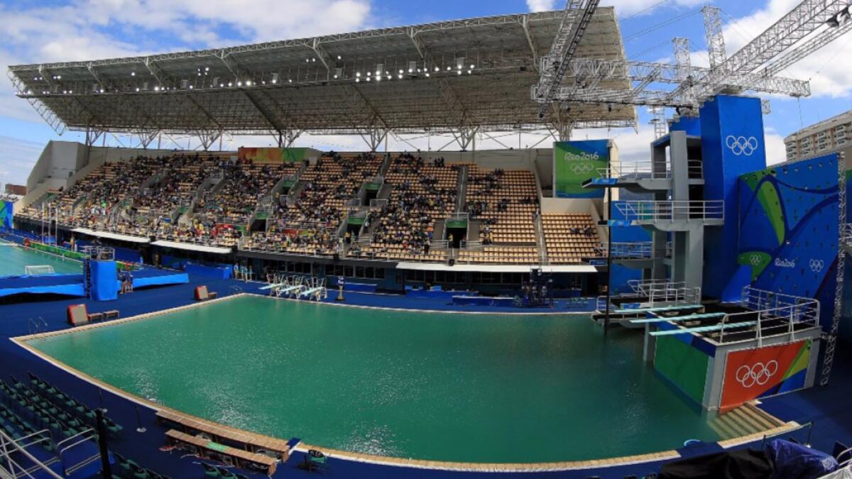 The diving pool, who has turned green, is shown on Aug. 11, Day 6 of the Rio de Janeiro Games. Algae may be the cause.