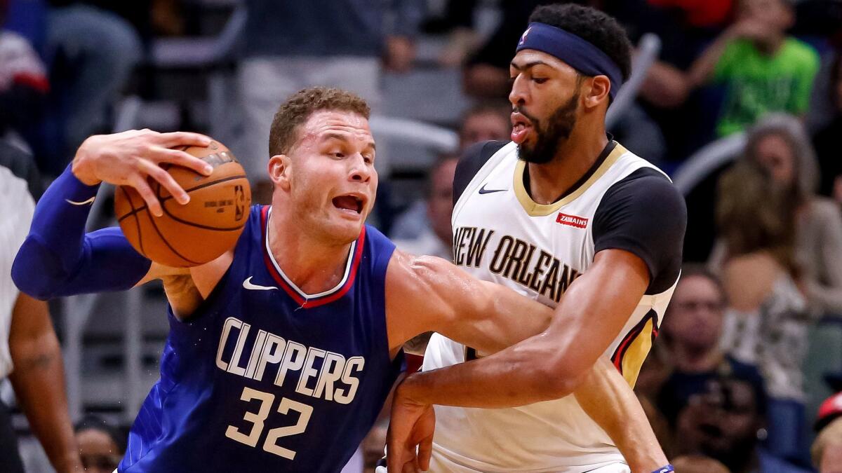 Pelicans forward Anthony Davis defends Clippers forward Blake Griffin (32) in the post during a game last week.